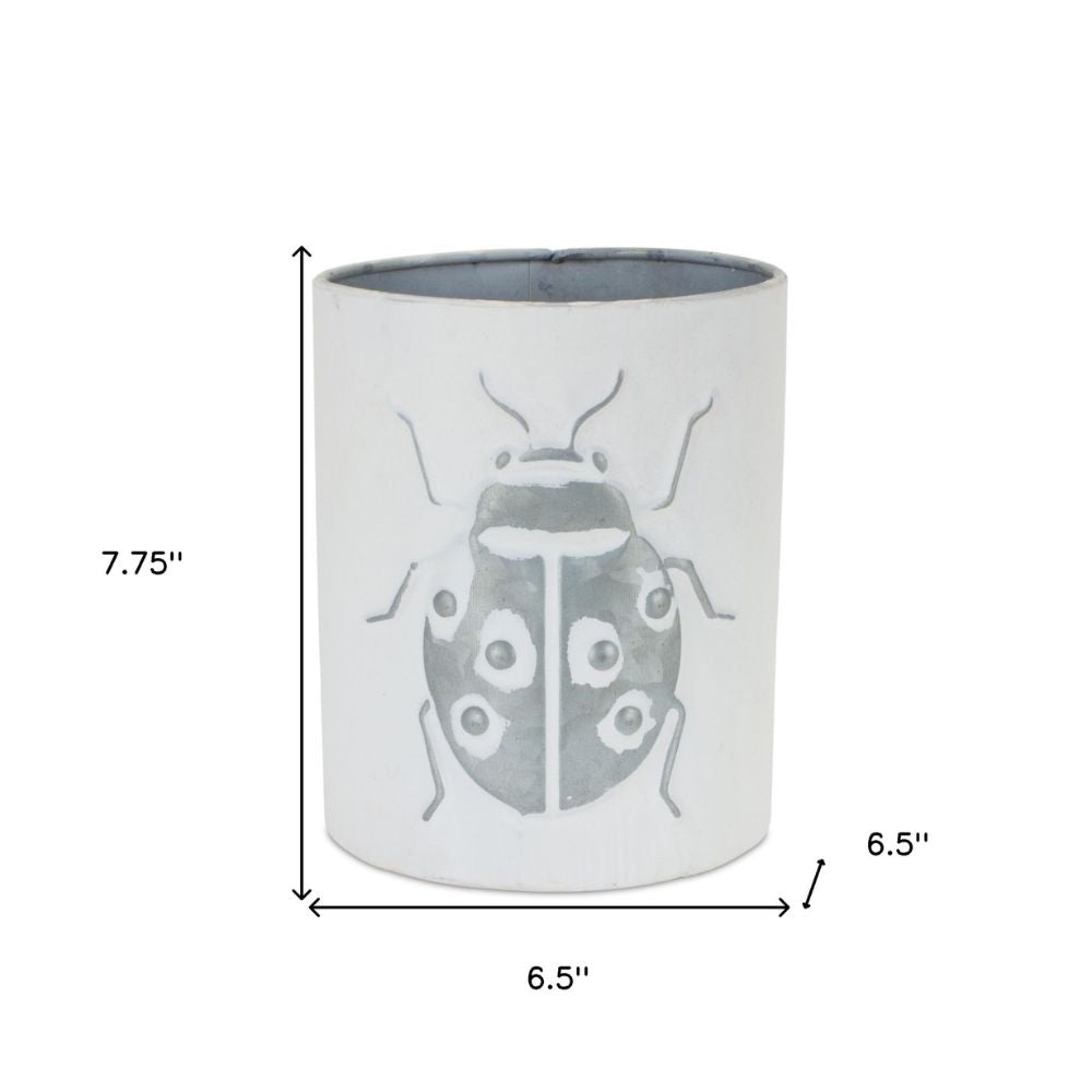 Set of Three White and Gray 9-Ounce Metal Abstract Round Distressed Pot Planters